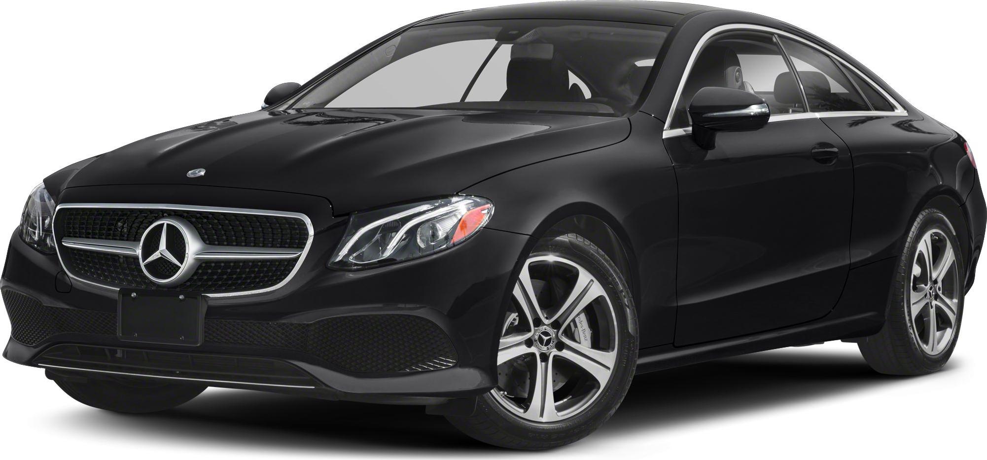 Front angled view of a luxury coupe with LED headlights and alloy wheels.