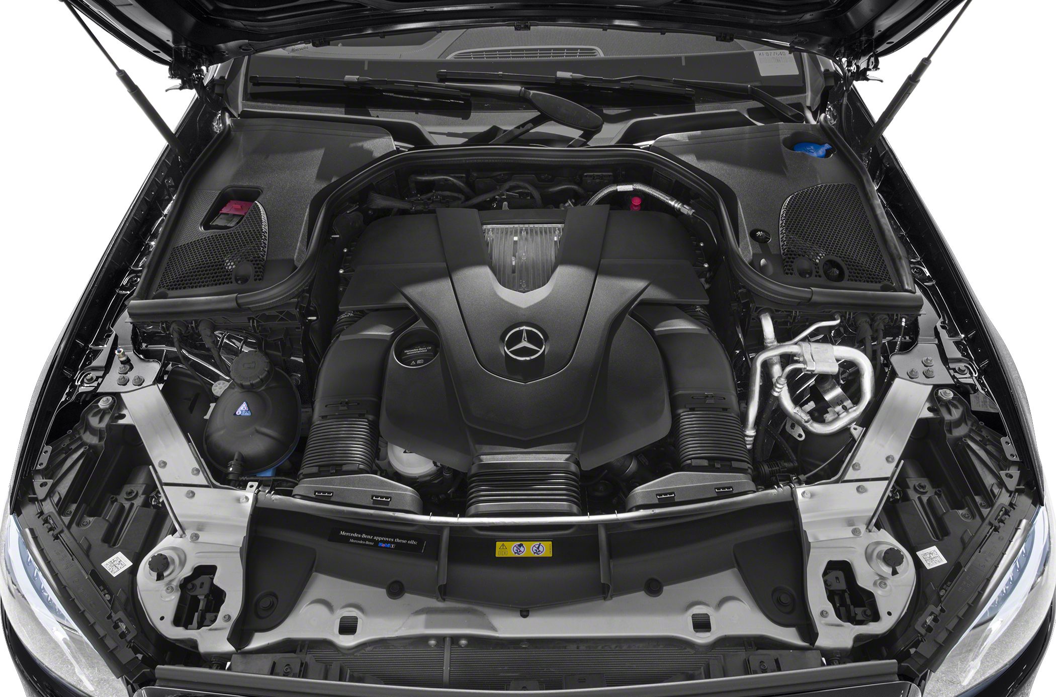 Engine bay of a modern luxury coupe with V6 engine cover and components