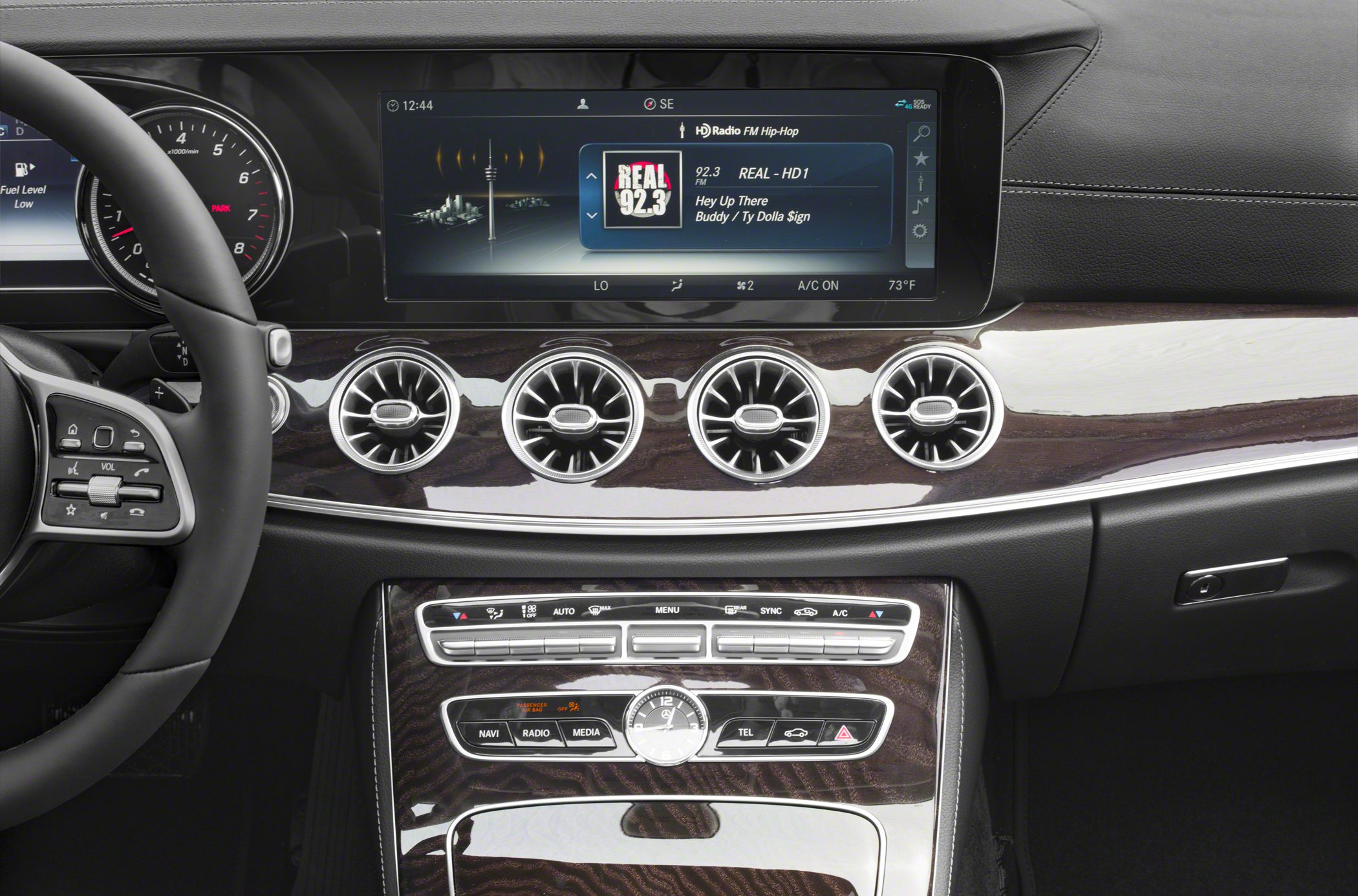 Luxury interior with turbine-style air vents and digital infotainment display