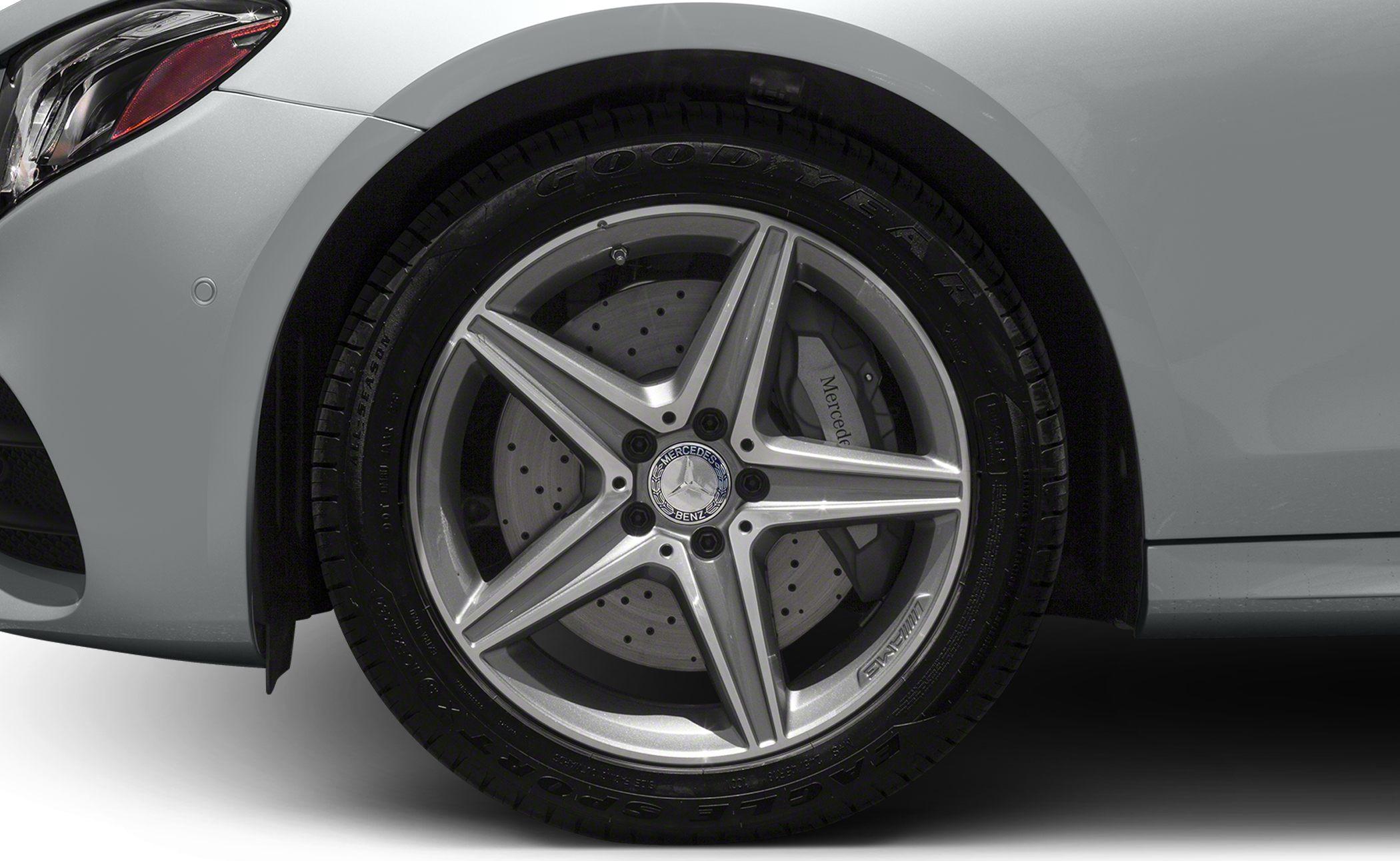 Close-up of AMG alloy wheel and perforated brake disc