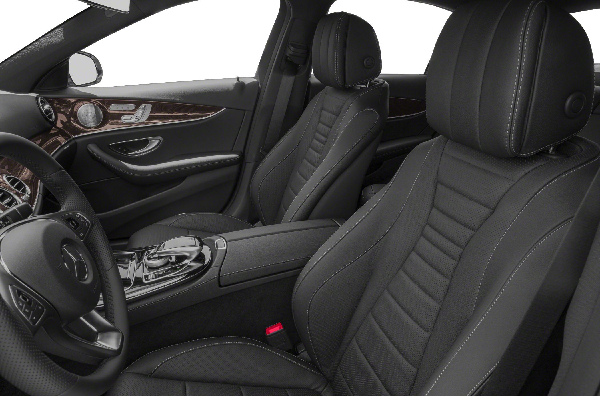 Black leather luxury seats and wood-trimmed dashboard in vehicle interior