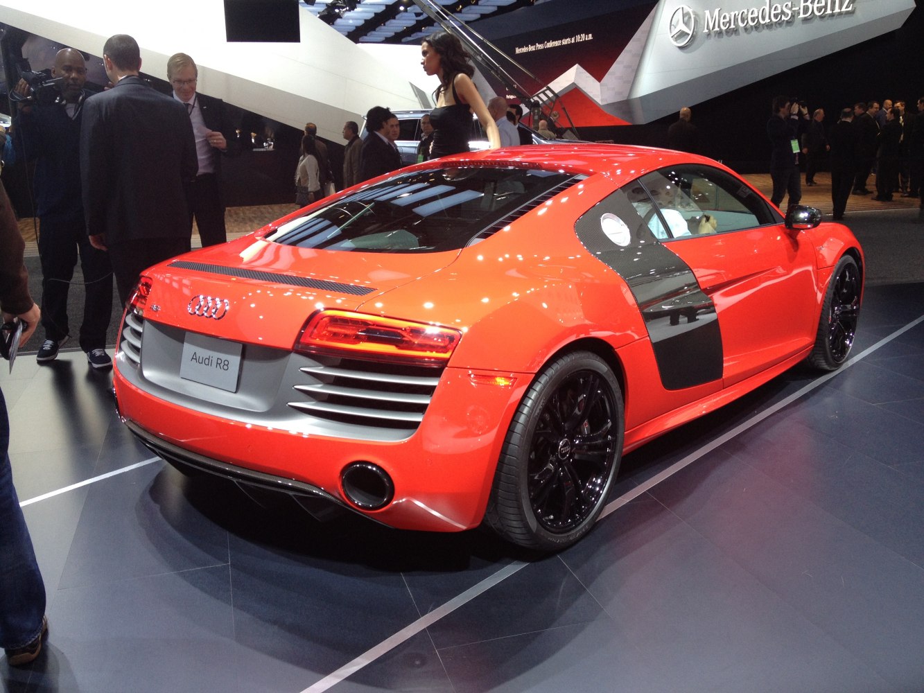 Rear and side view with black sideblade and sport exhaust.