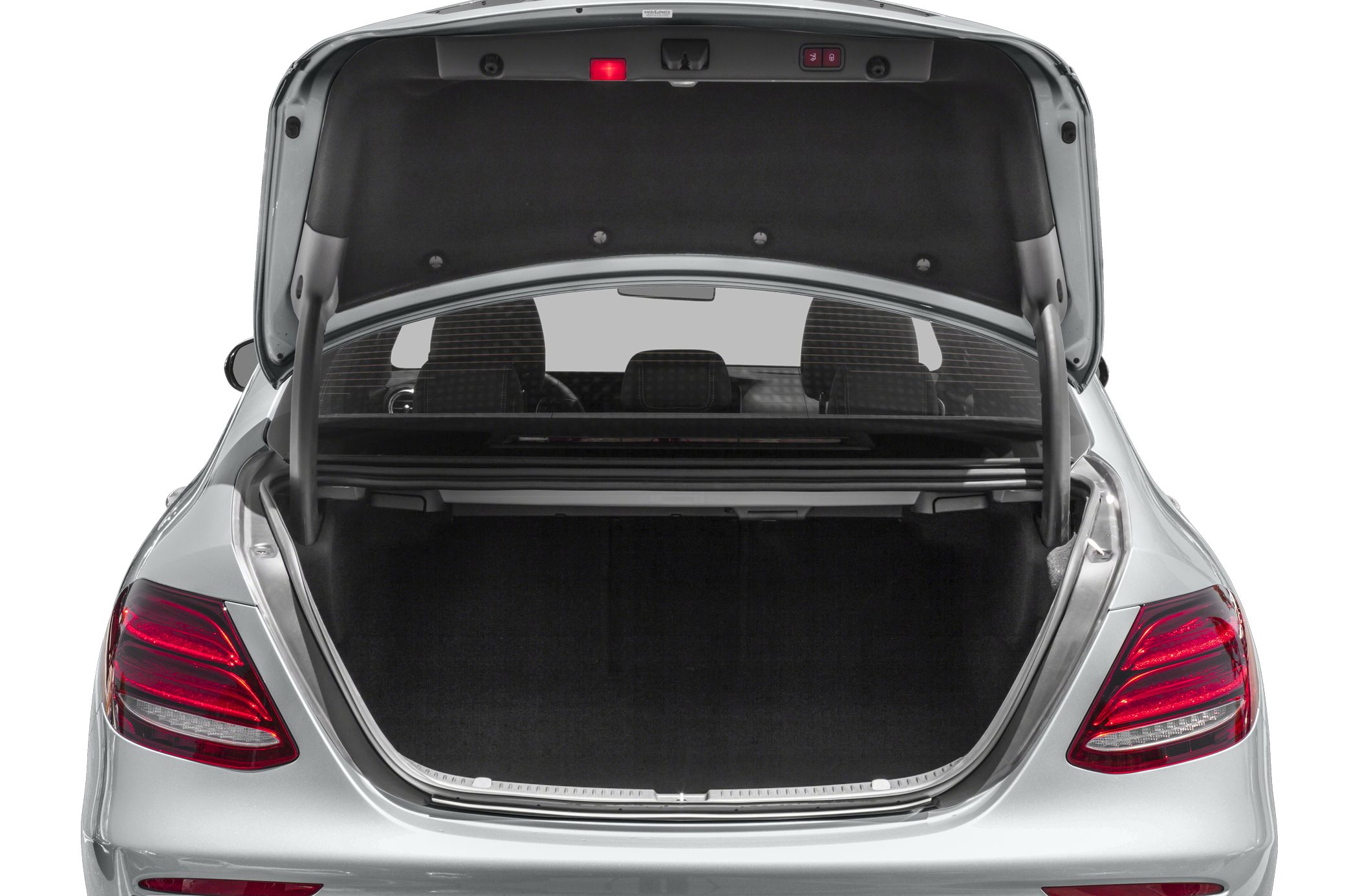 Open trunk with rear seatbacks and tail lights visible