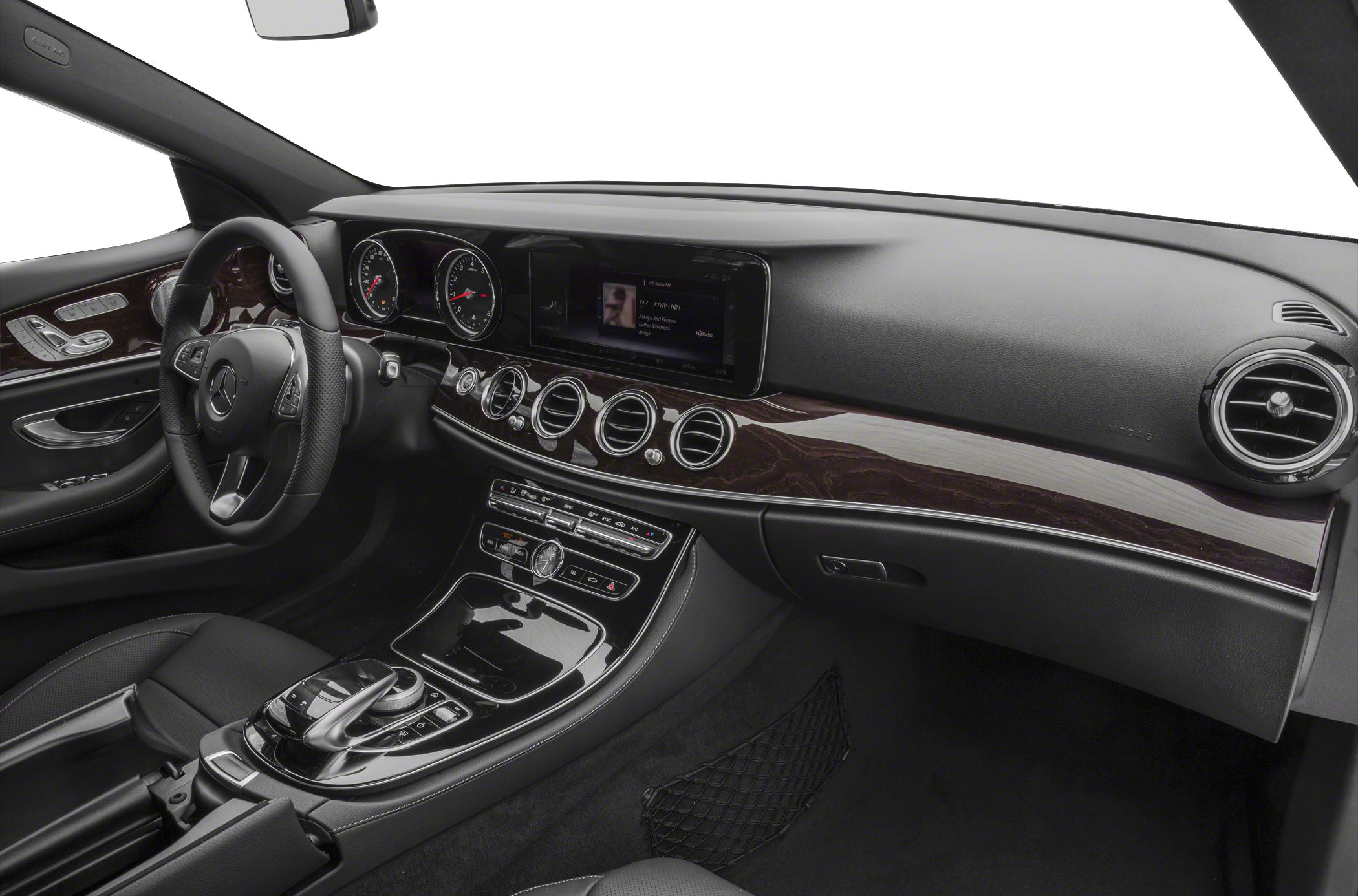 Digital instrument cluster and wood trim dashboard with multifunction steering wheel