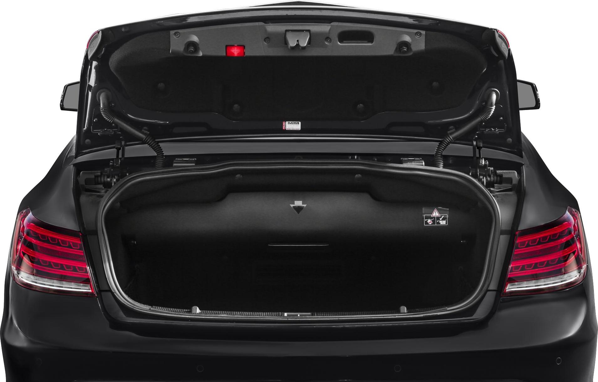 Open trunk with visible cargo area and trunk lid components