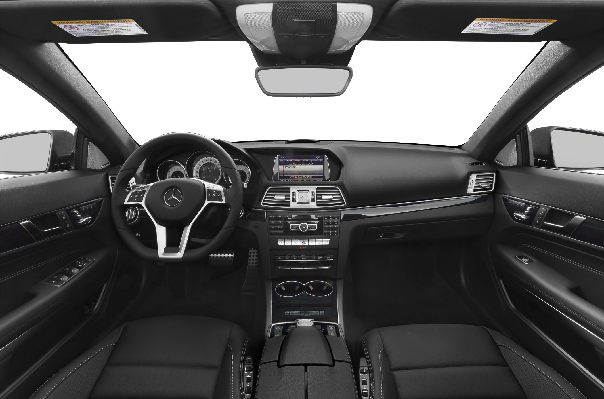 Luxury car dashboard and steering wheel with central display and control buttons