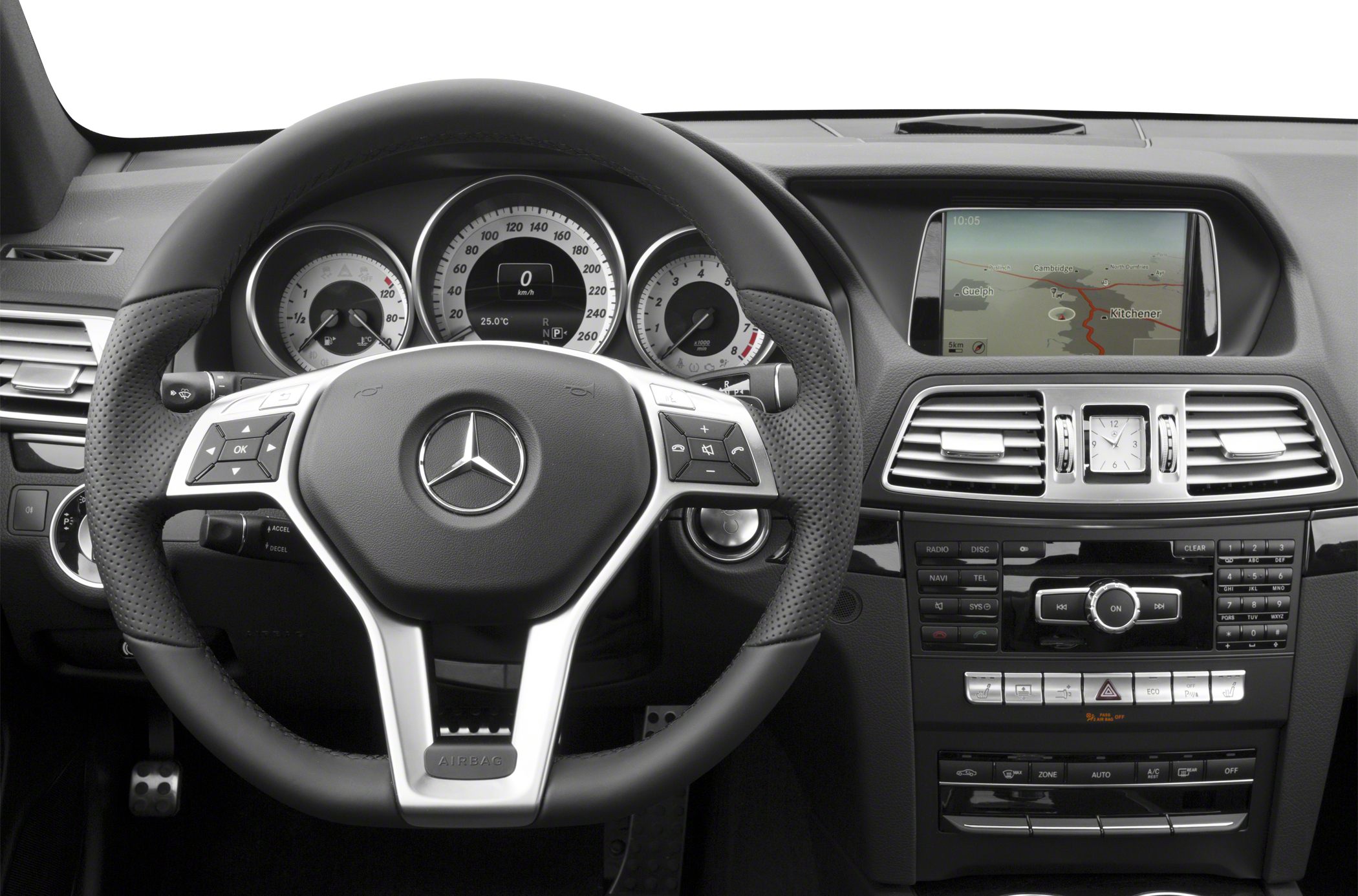 Steering wheel, instrument cluster, and central console with navigation display