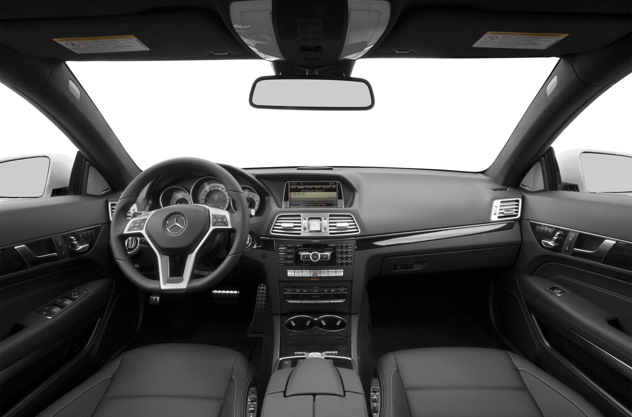 Black leather interior with dashboard, steering wheel, and infotainment screen