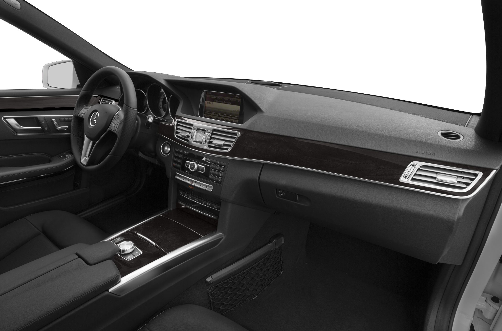 Luxury sedan dashboard and center console with wood trim and advanced controls