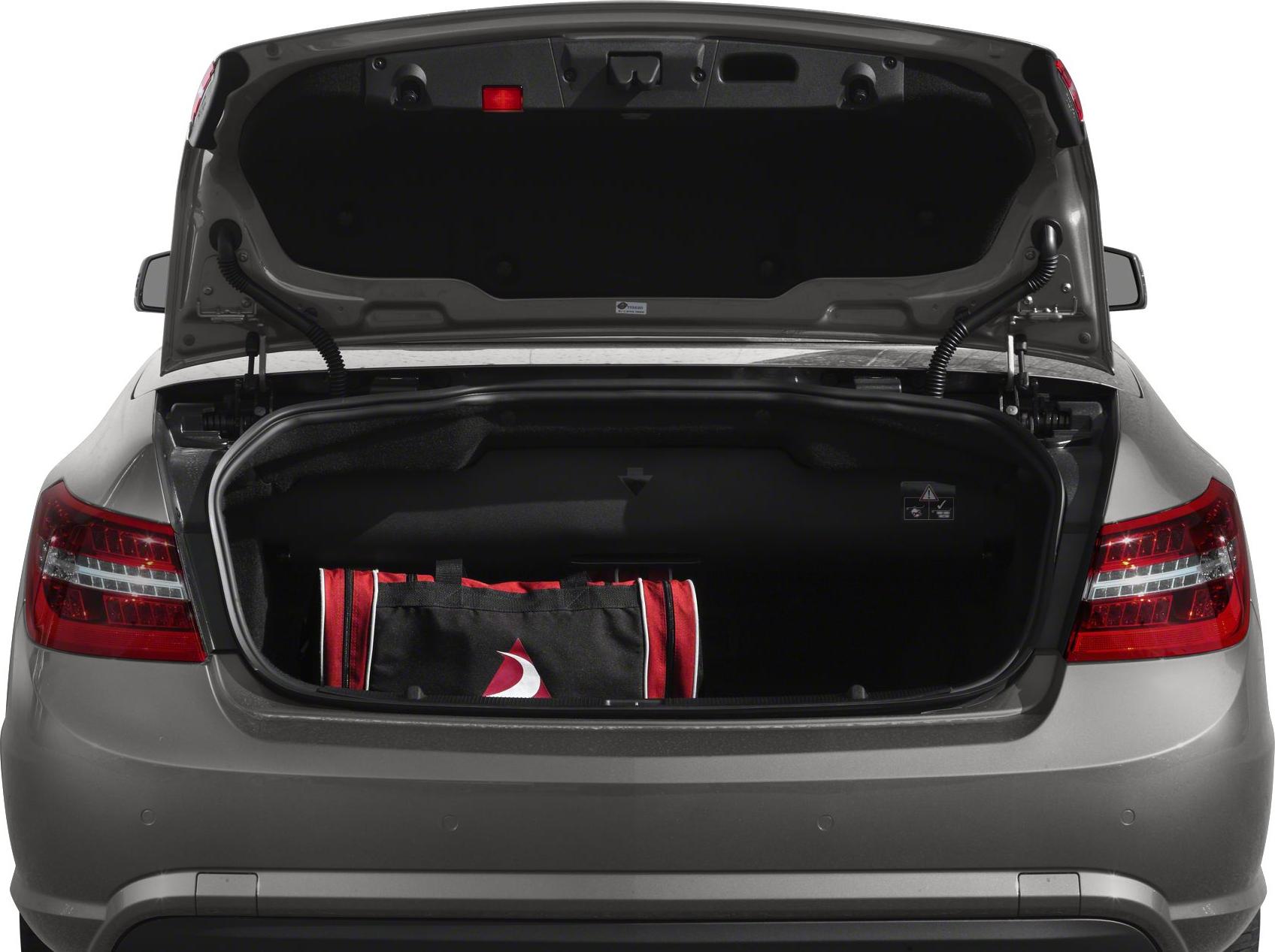 Open trunk with visible storage space and rear lights