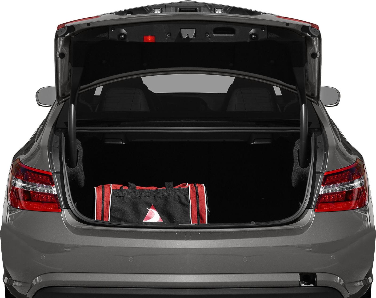Open trunk with red and black bag inside, clear rear tail lights