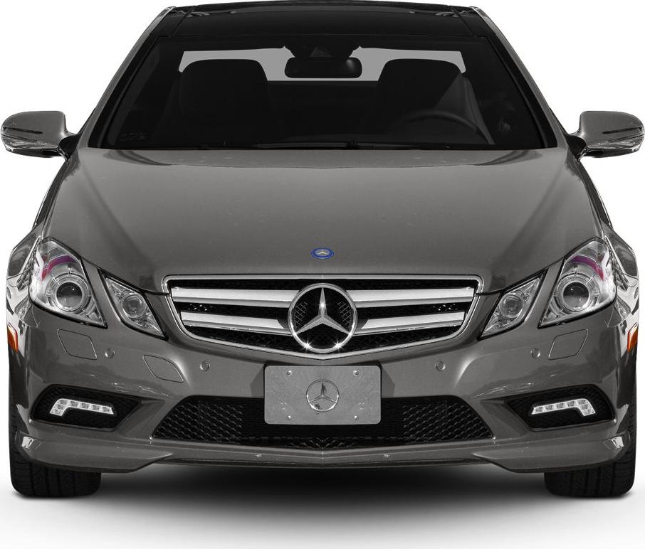 Front profile showing prominent grille and LED daytime running lights
