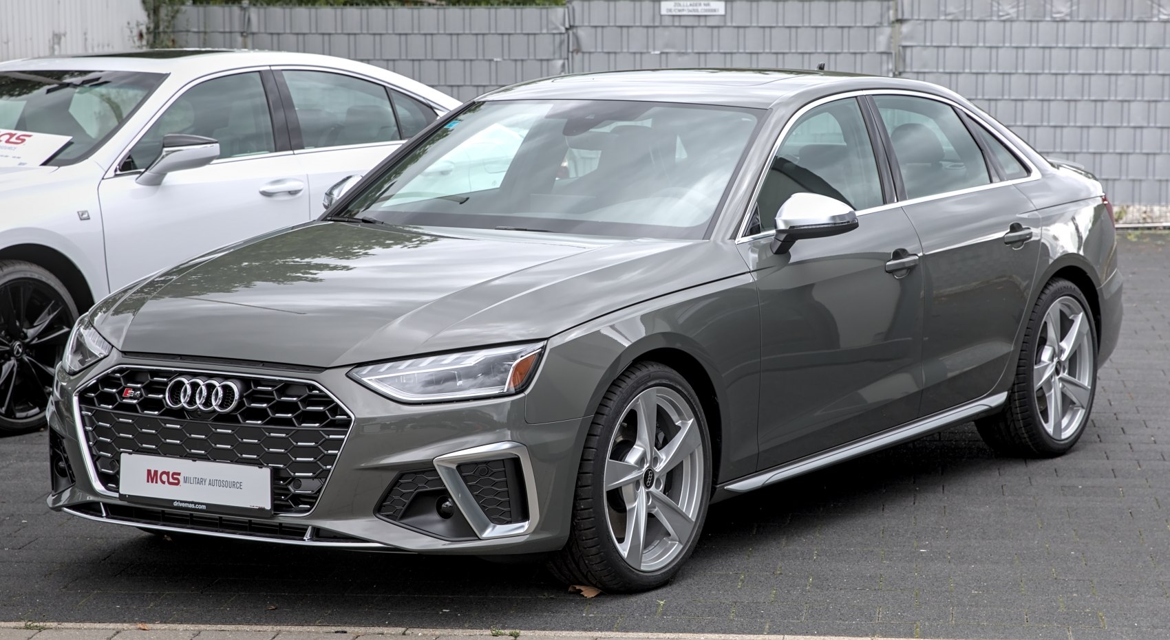 Front and side view with hexagonal grille and alloy wheels