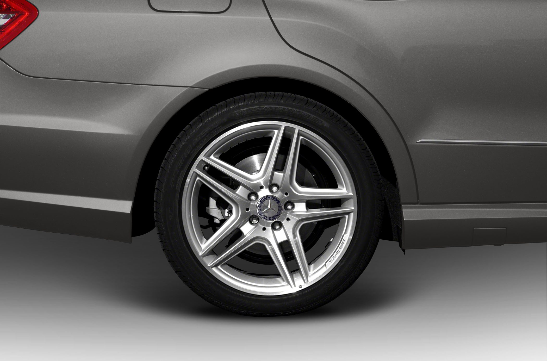 Rear wheel with five-spoke alloy rim and brake disc
