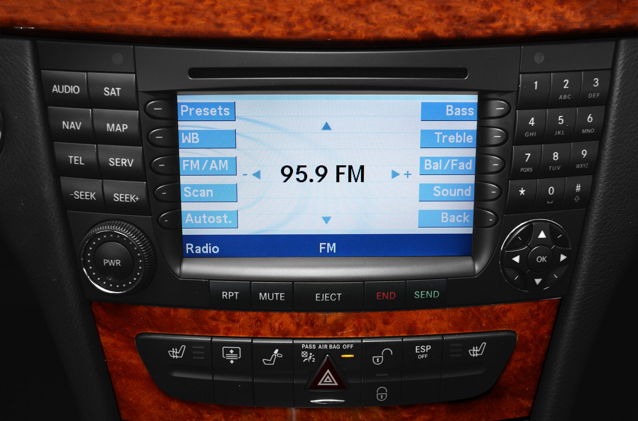 Multimedia control panel with FM radio and climate controls