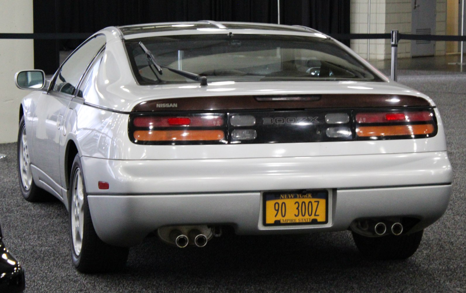 Rear view with distinct tail lights and dual exhausts