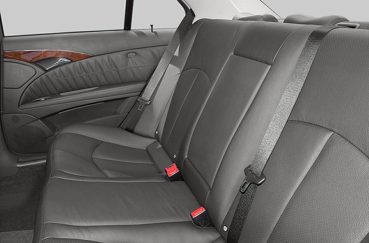 Rear leather seats and door panel with wood trim