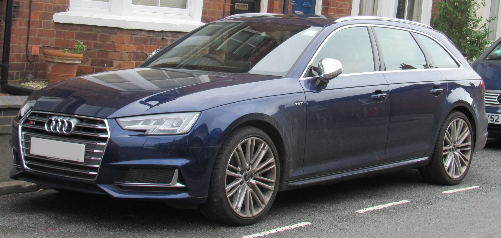 Blue Audi S4 Avant B9 side view with front grille and alloy wheels