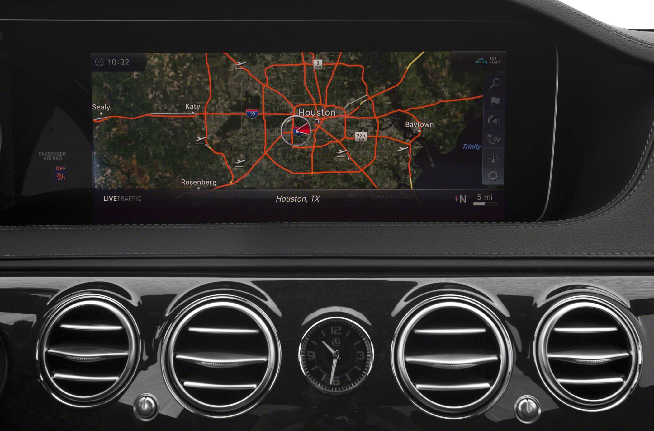 High-res navigation screen with four circular air vents and analog clock