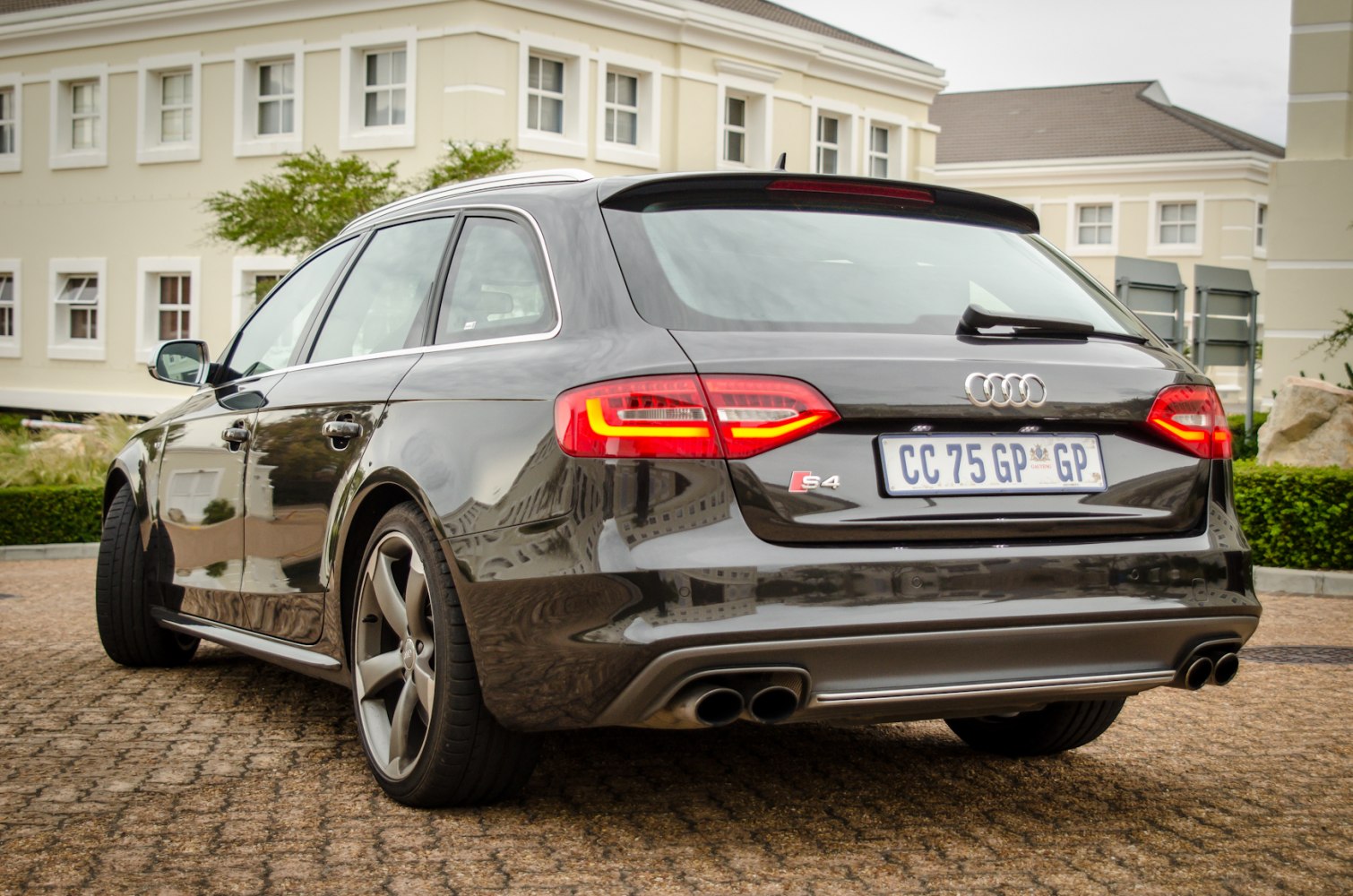LED tail lights and quad exhaust pipes on black sport wagon