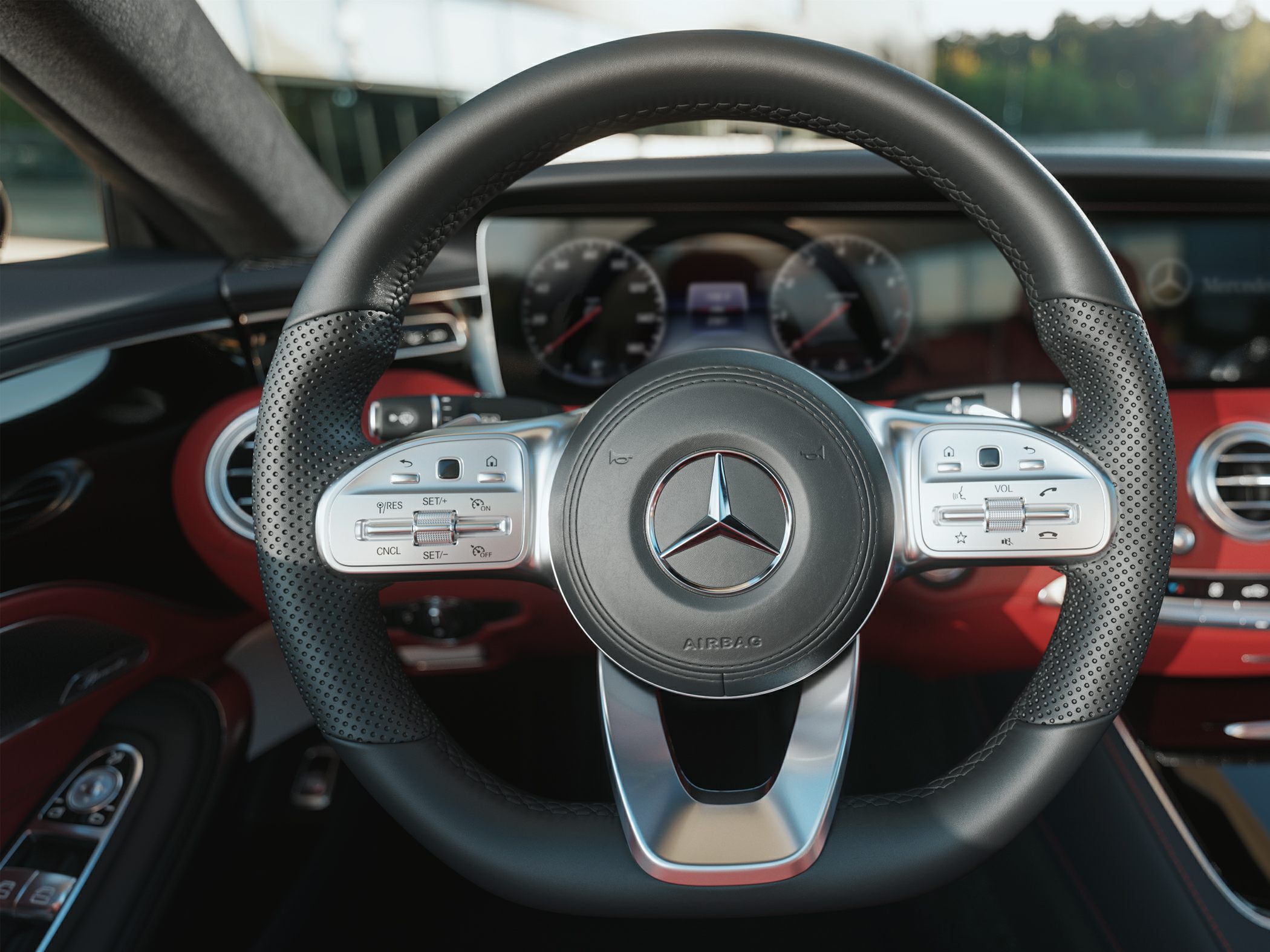 Luxury perforated leather steering wheel with multi-function controls