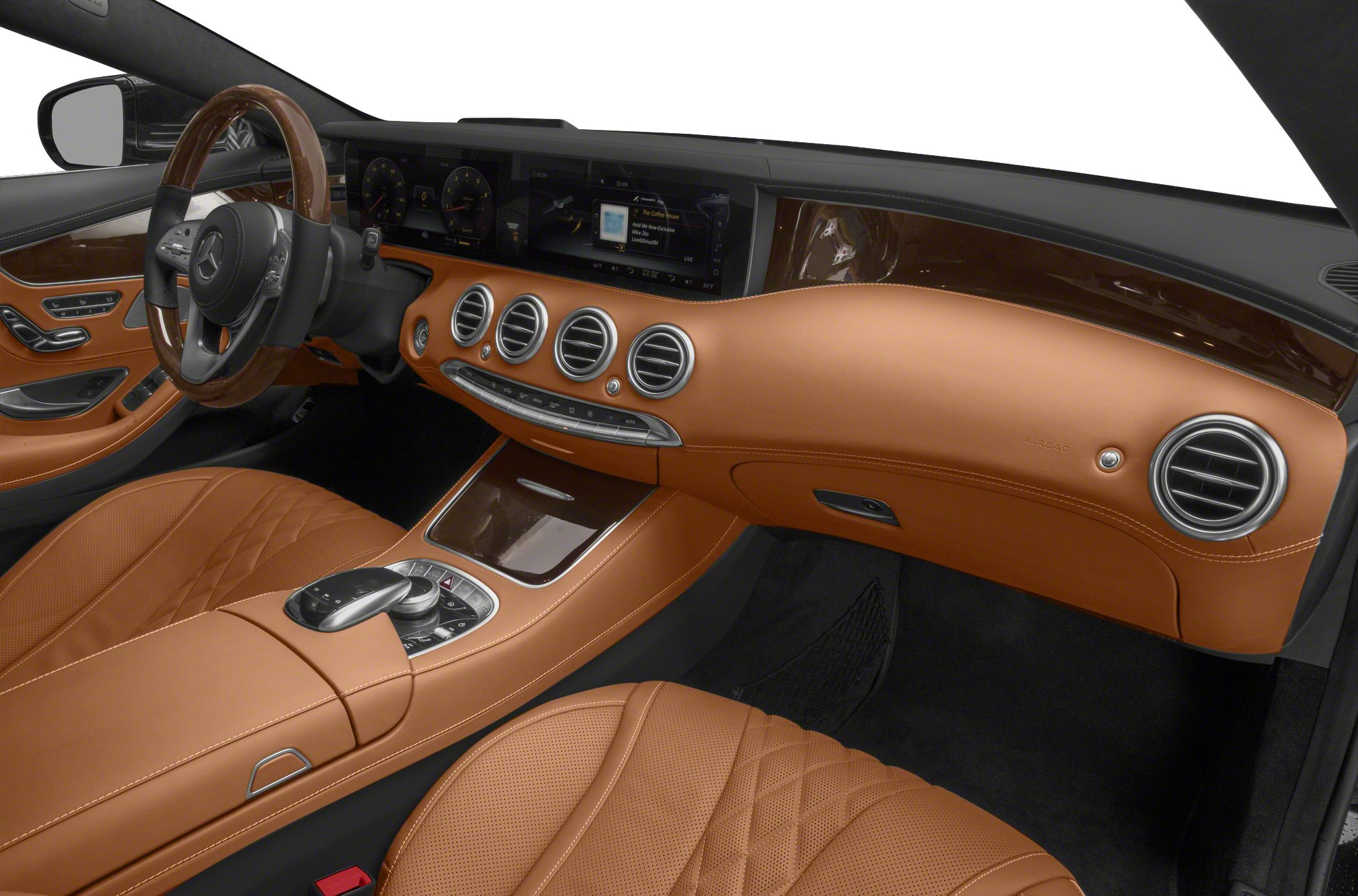 Tan leather interior with digital dashboard and wooden trim