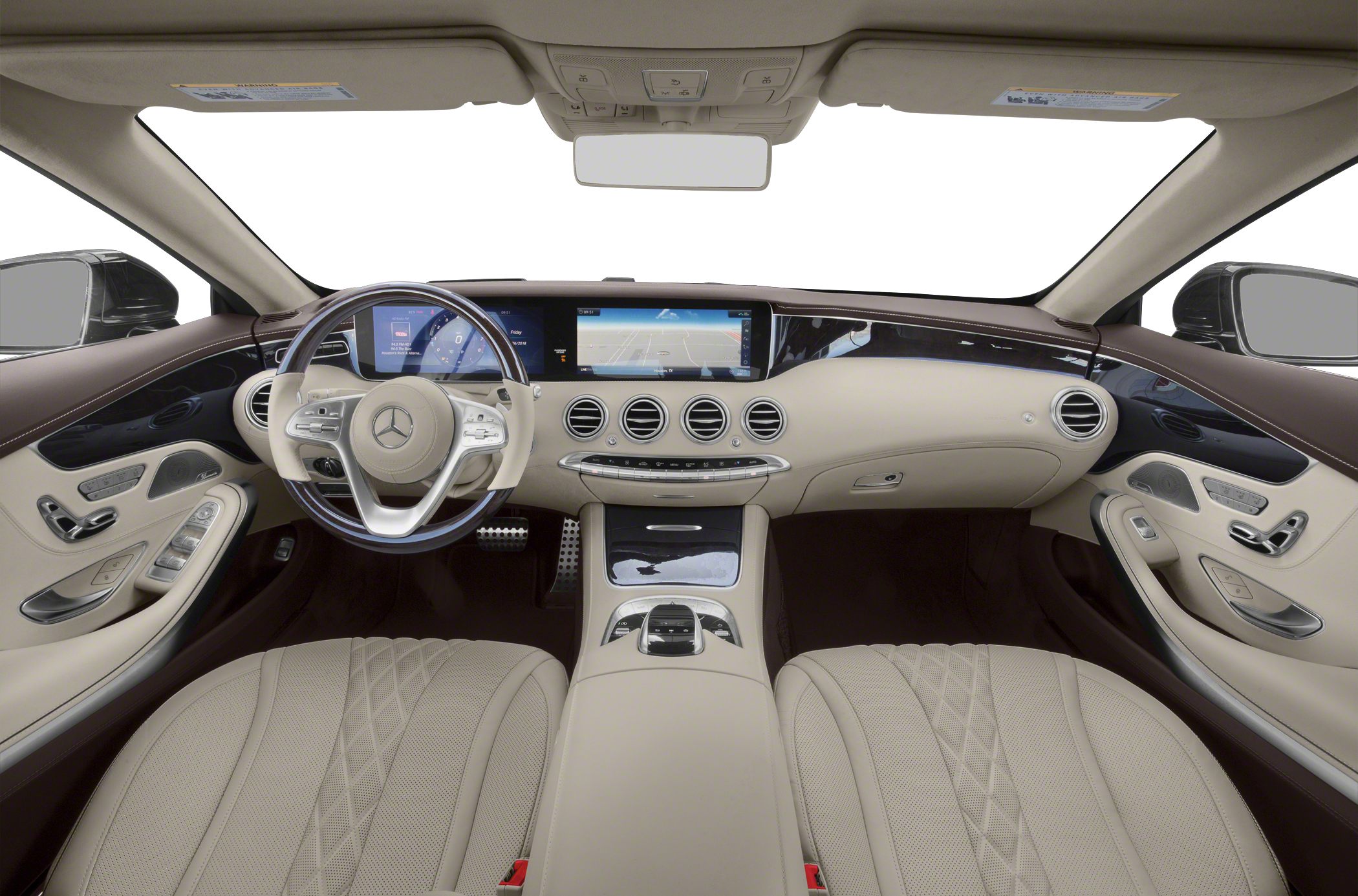 Luxury dashboard with dual digital screens and plush leather seats