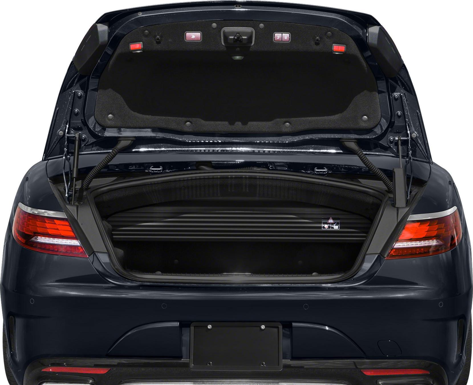 Open rear trunk lid with spacious trunk and interior components visible