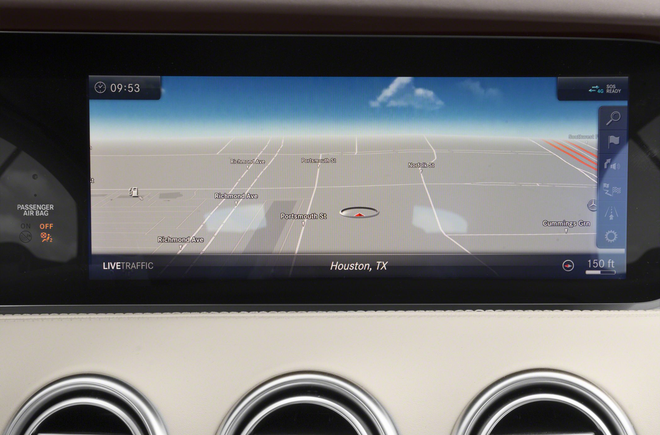 Digital GPS navigation display with live traffic on luxury car dashboard
