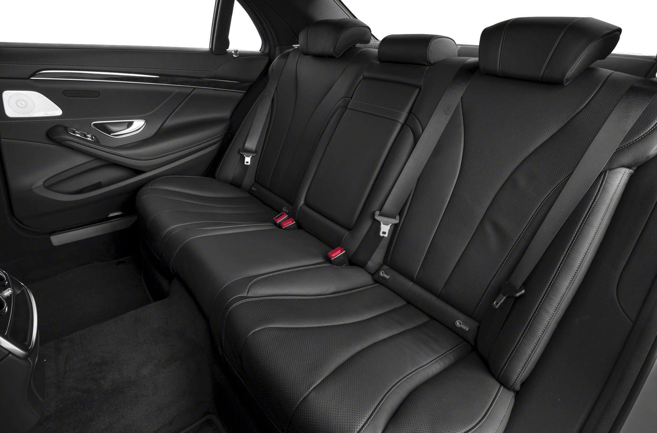 Black leather rear passenger seats with premium stitching and seatbelts.