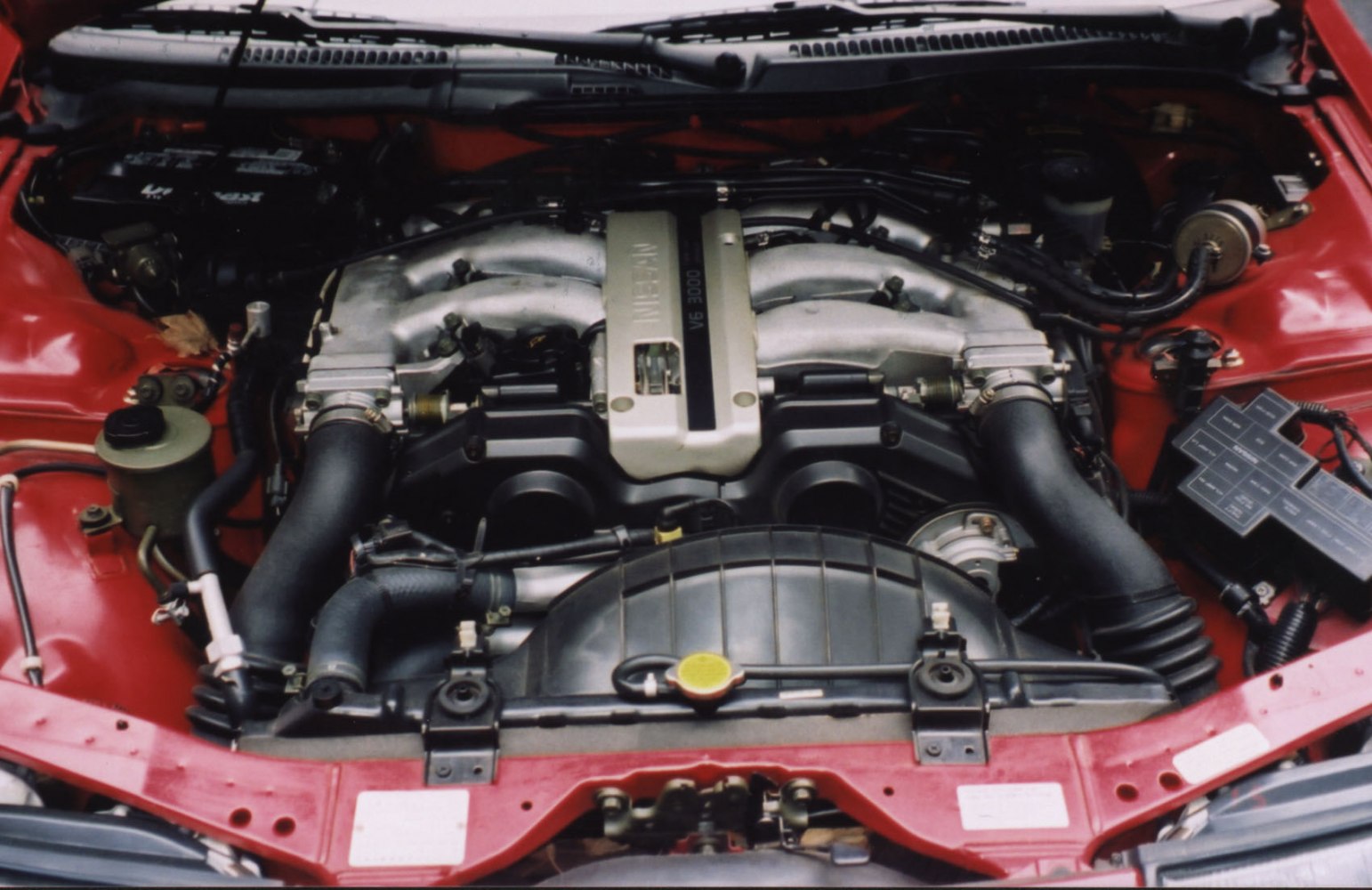 Engine bay with inline engine layout and visible components