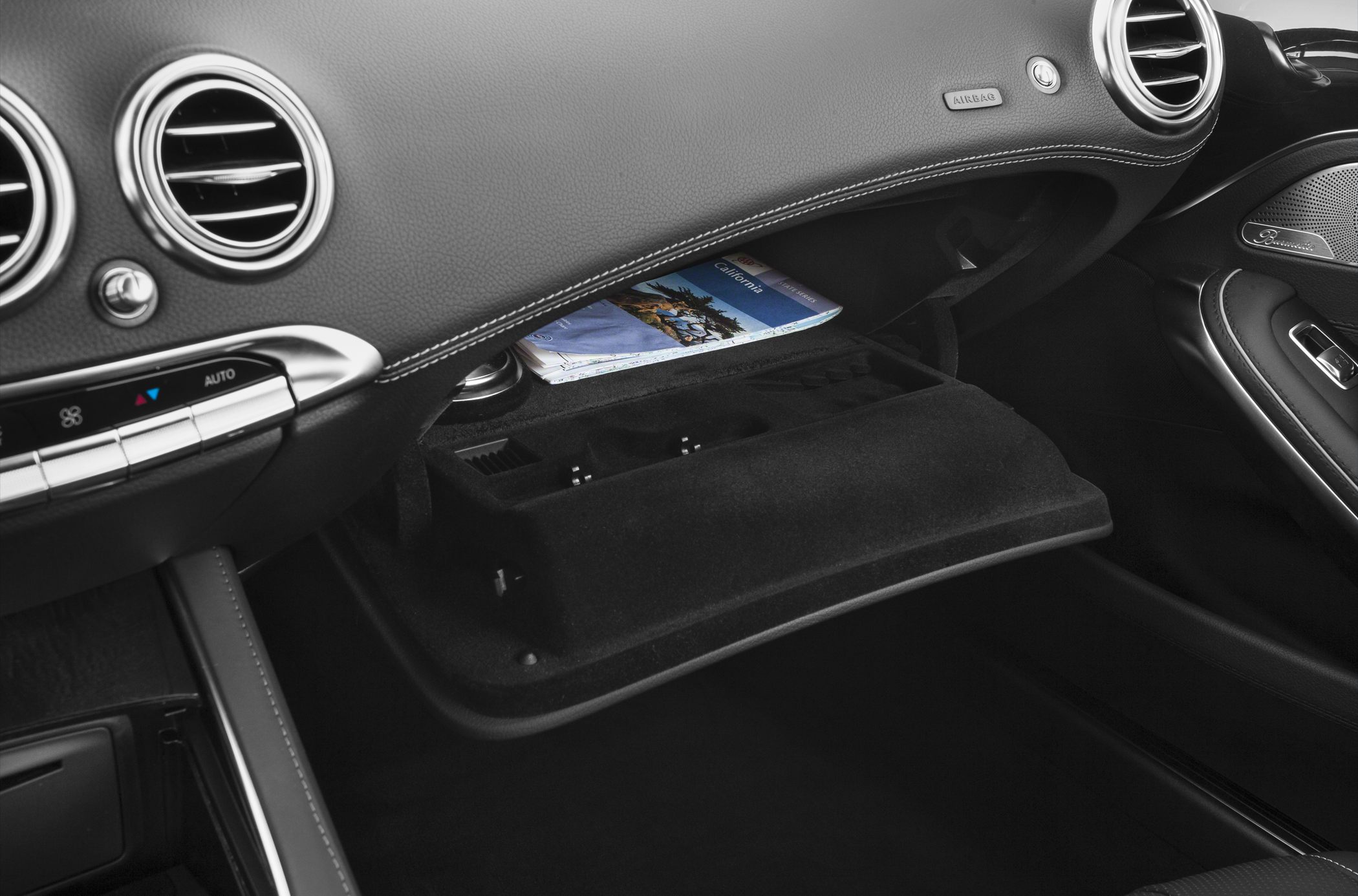 Open glove compartment and luxury dashboard vent details