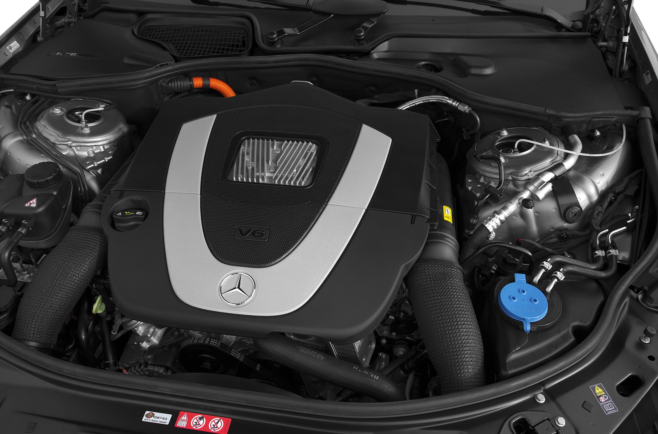 Close-up of V6 engine with prominent cover and components