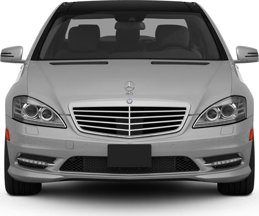 Close-up front of luxury sedan grille and headlights.