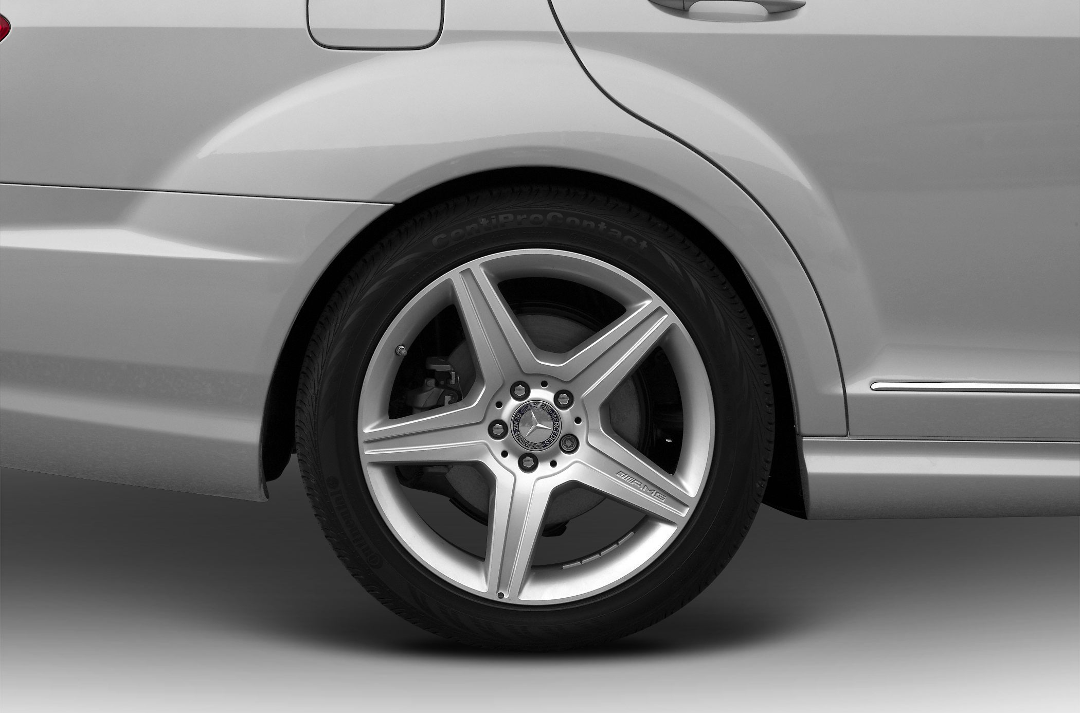 AMG five-spoke alloy rear wheel and tire close-up