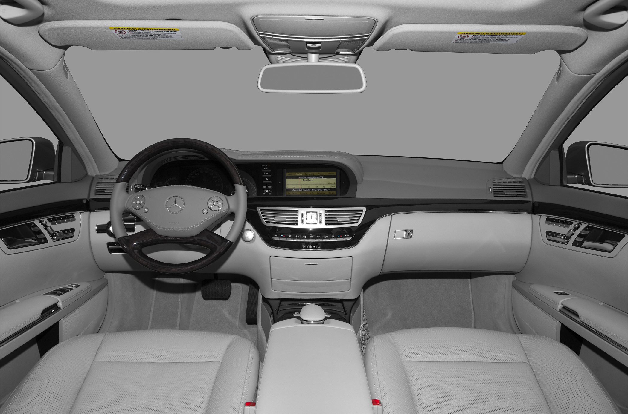 Luxury car interior with dashboard and steering wheel view