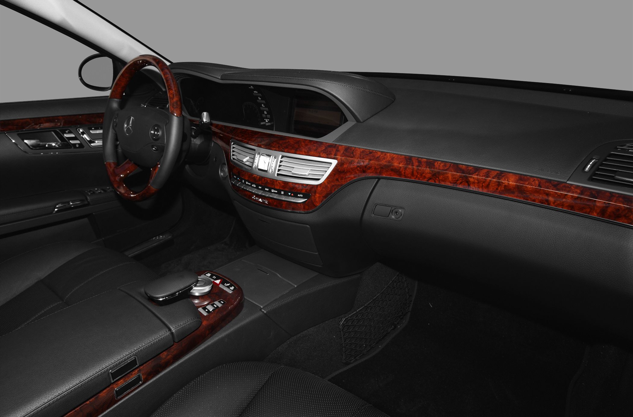 Luxury interior dashboard and wood trim with advanced controls