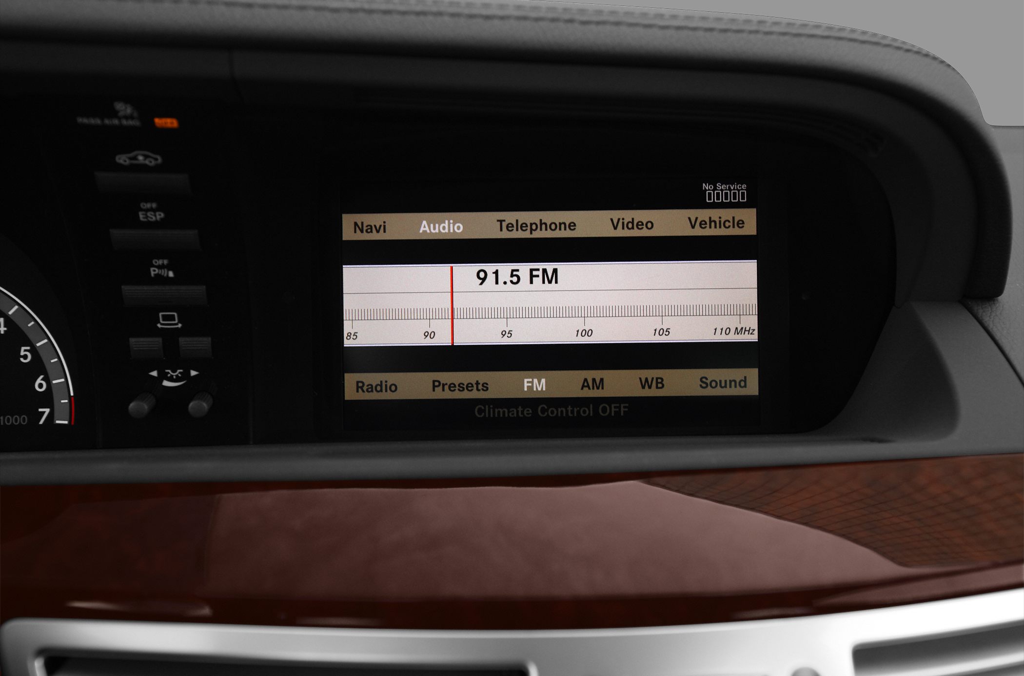 Dashboard digital control panel with audio and navigation interface.