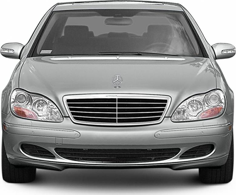 Front view with grille and dual headlight design