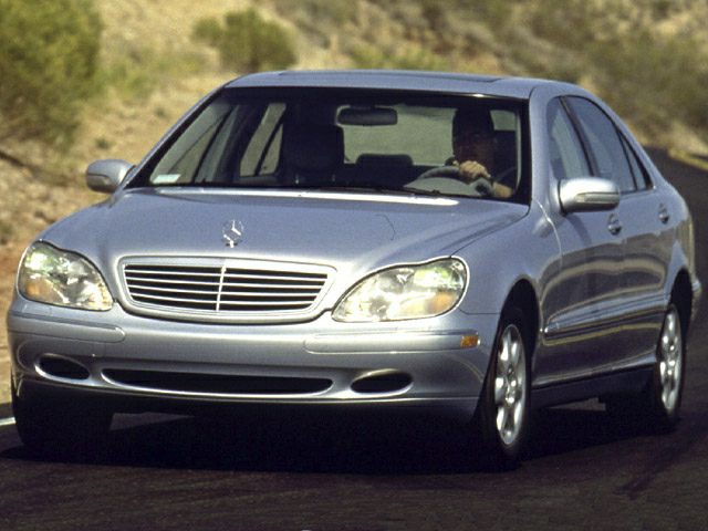 Front view of luxury sedan with chrome grille and rounded headlights
