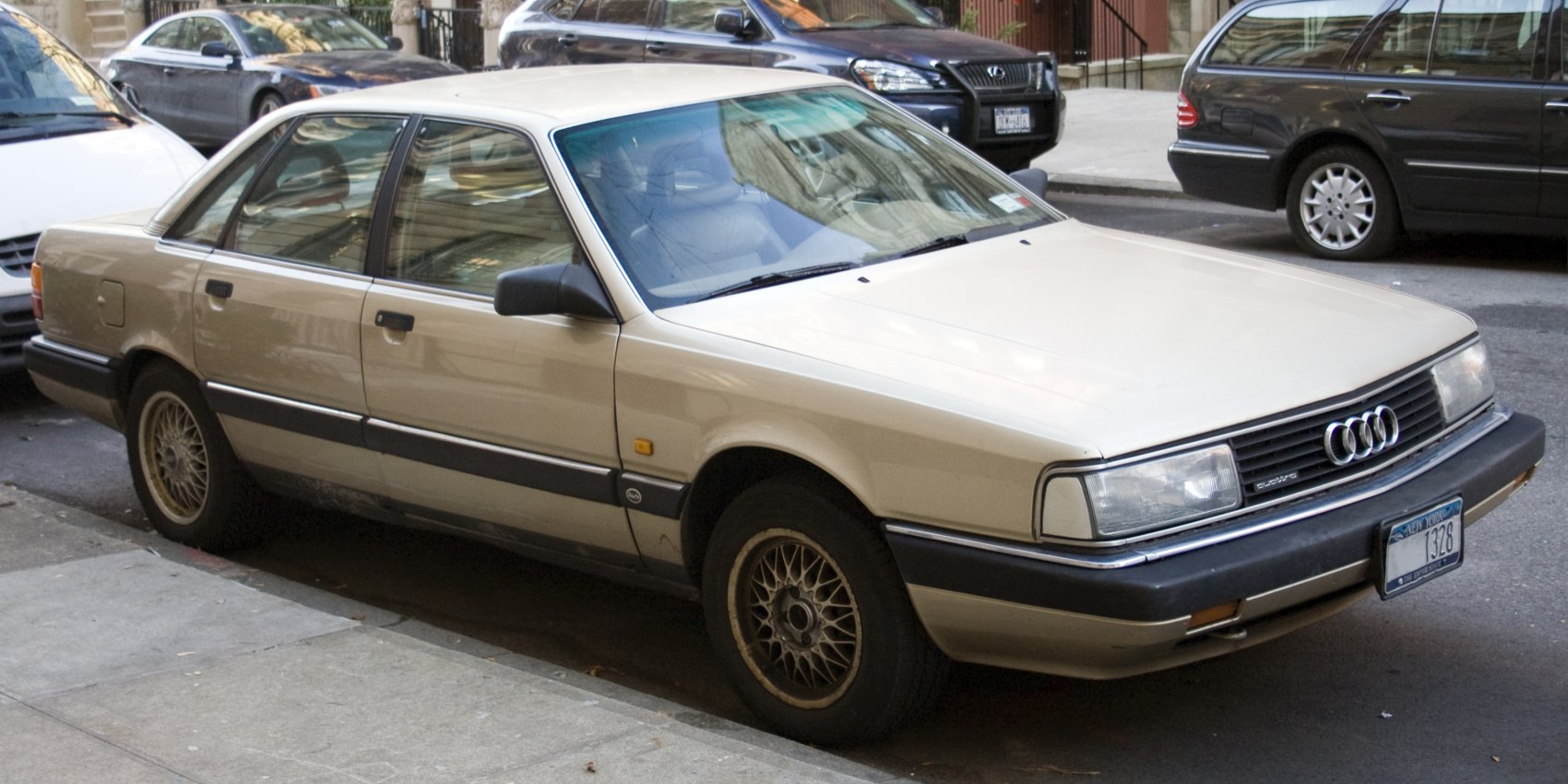 Classic sedan with iconic front grille and intricate alloy wheels