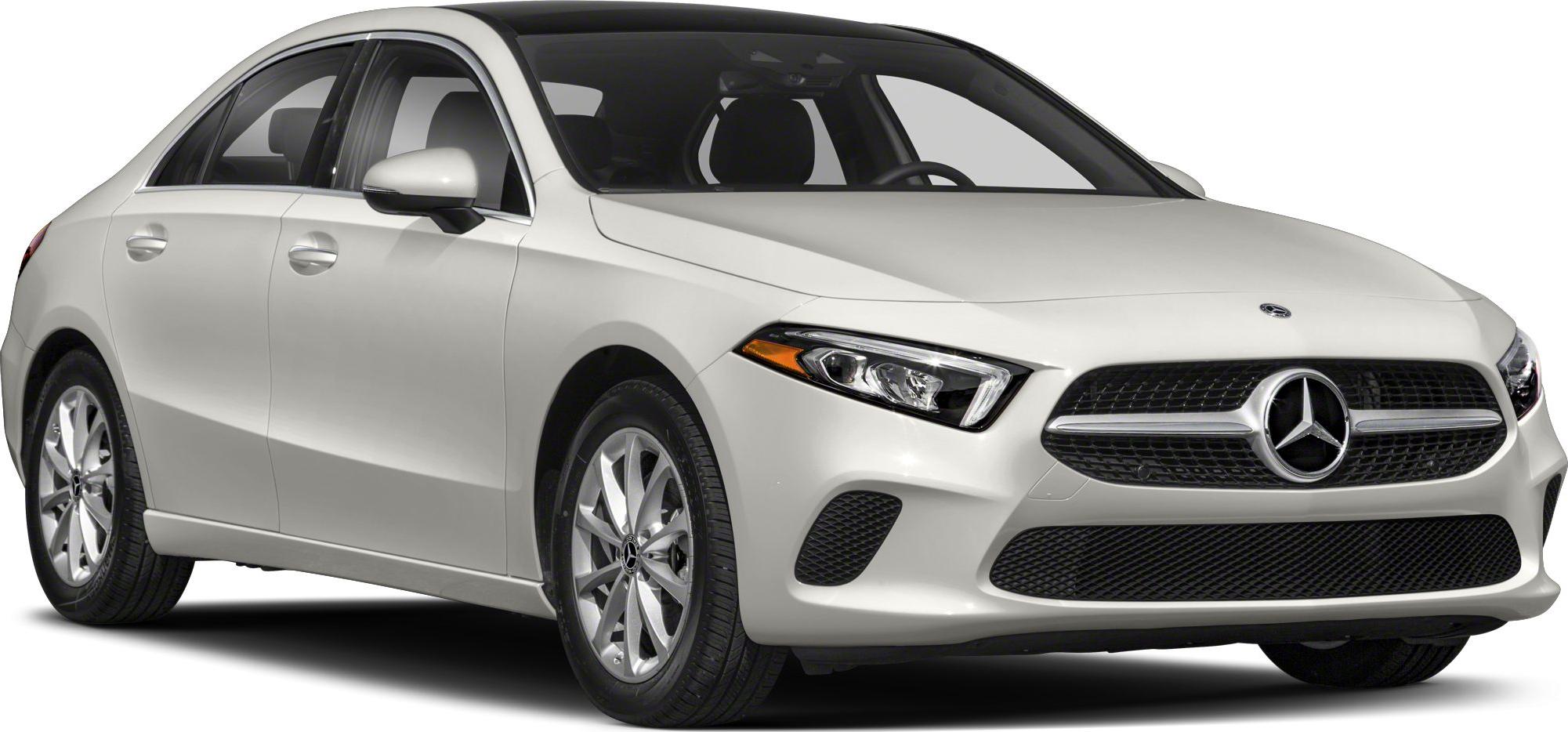 Front side with sleek headlights and grille of a compact luxury sedan