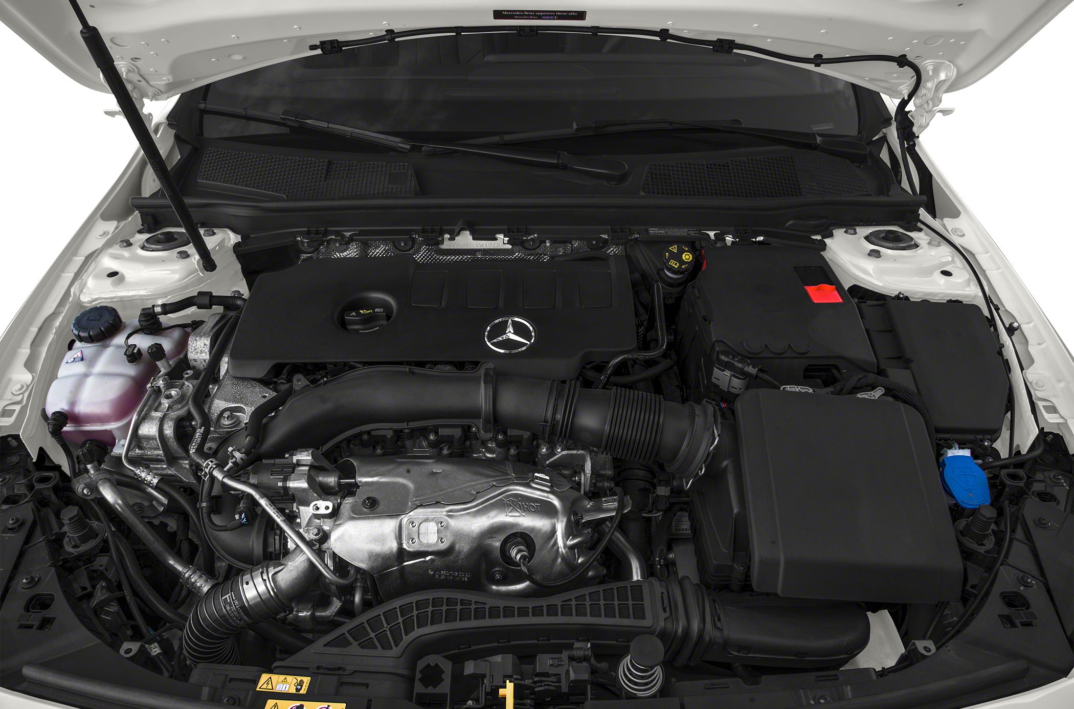Engine bay with cover, air intake, coolant reservoir, and fluid caps