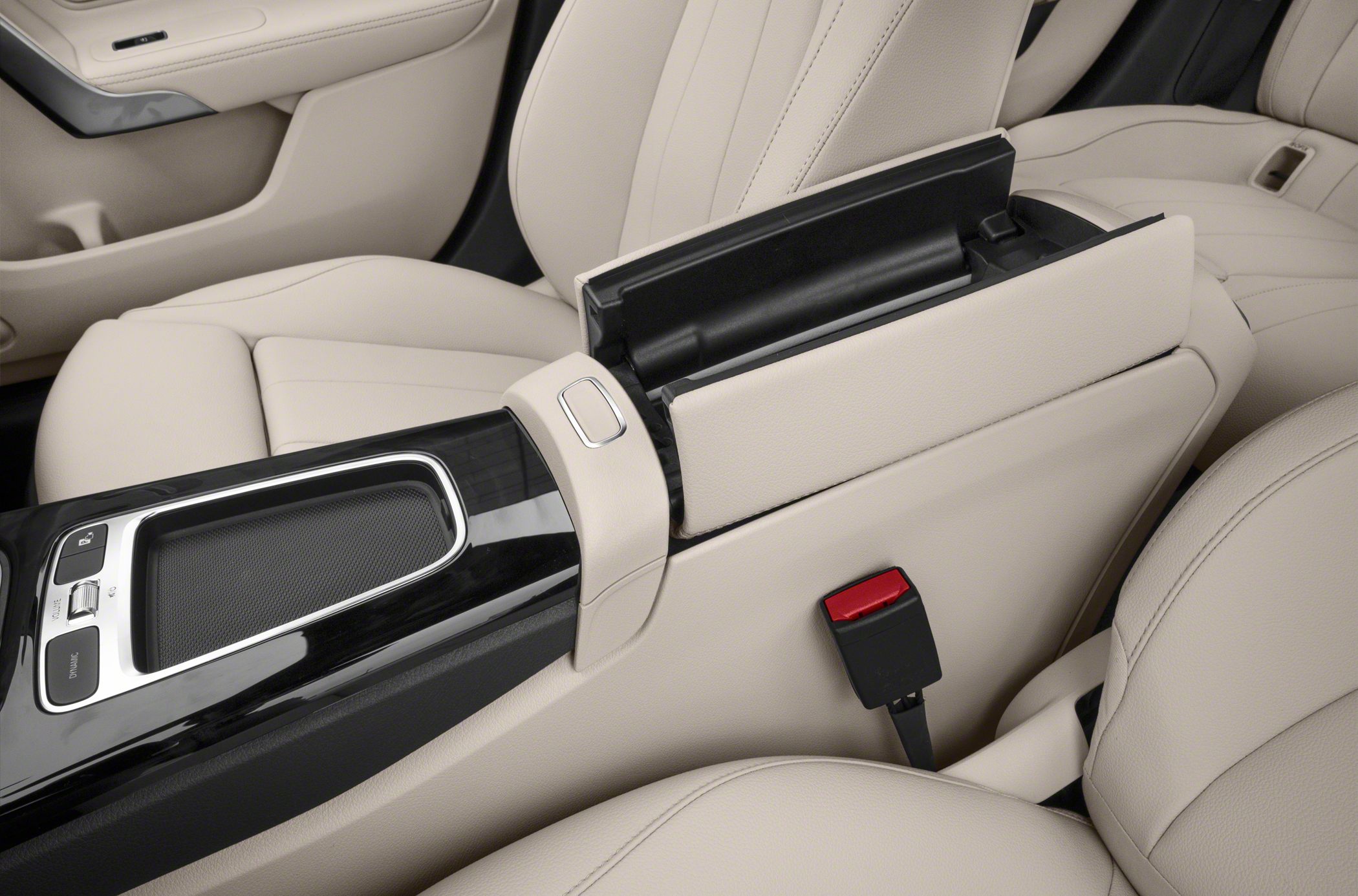 Beige leather seats with open central armrest storage
