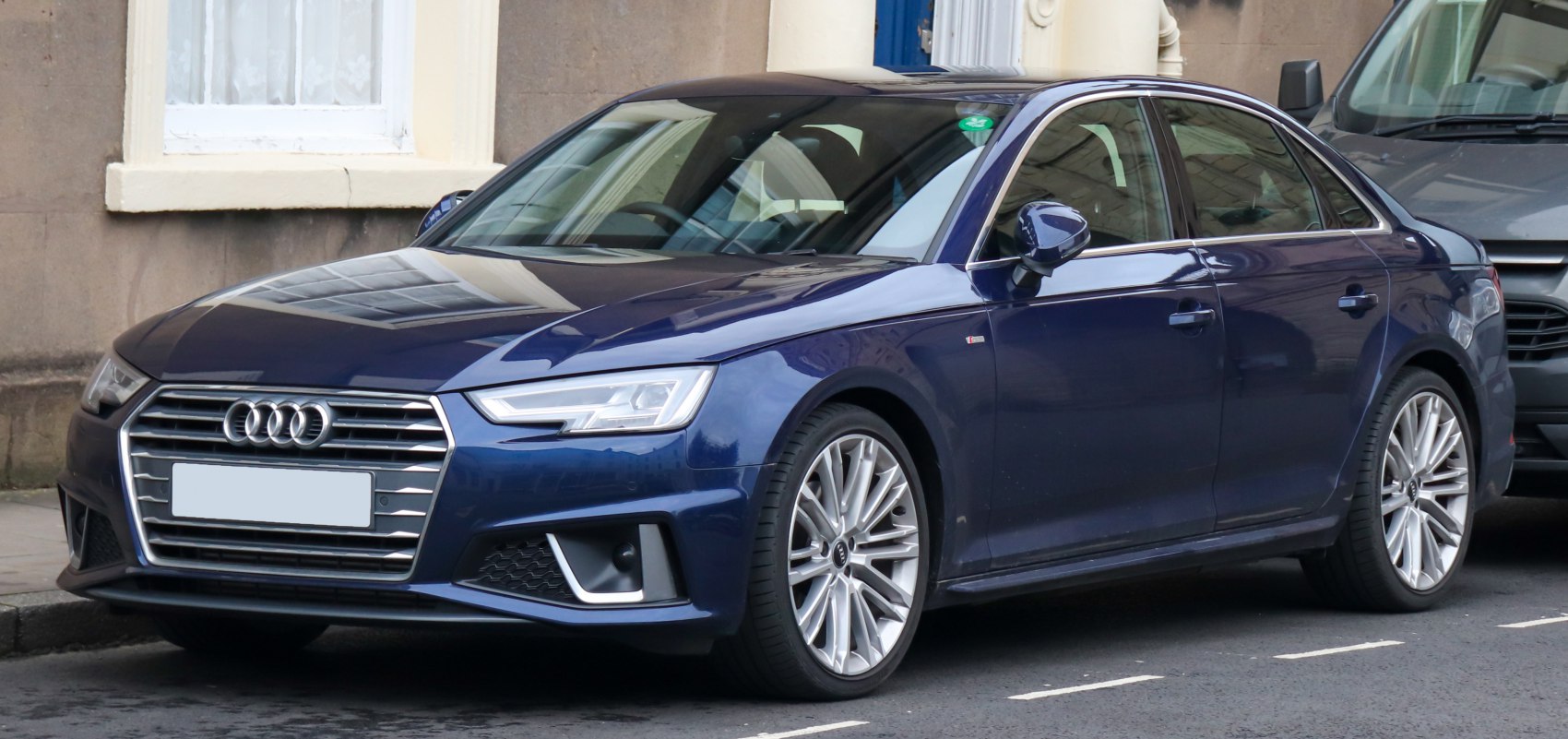 Front and side exterior with prominent grille and alloy wheels