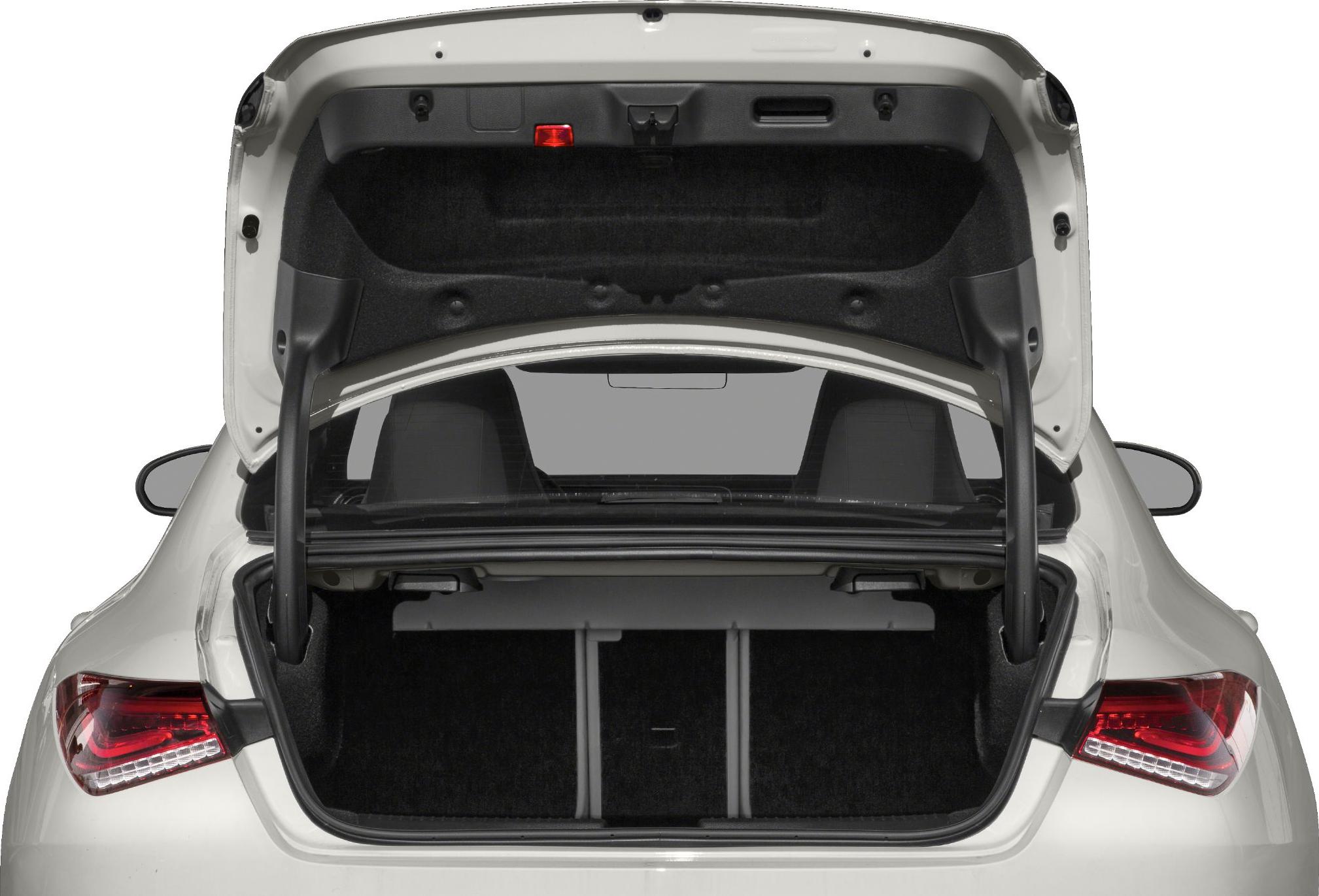 Rear view of an open trunk with folded rear seats and visible cargo space