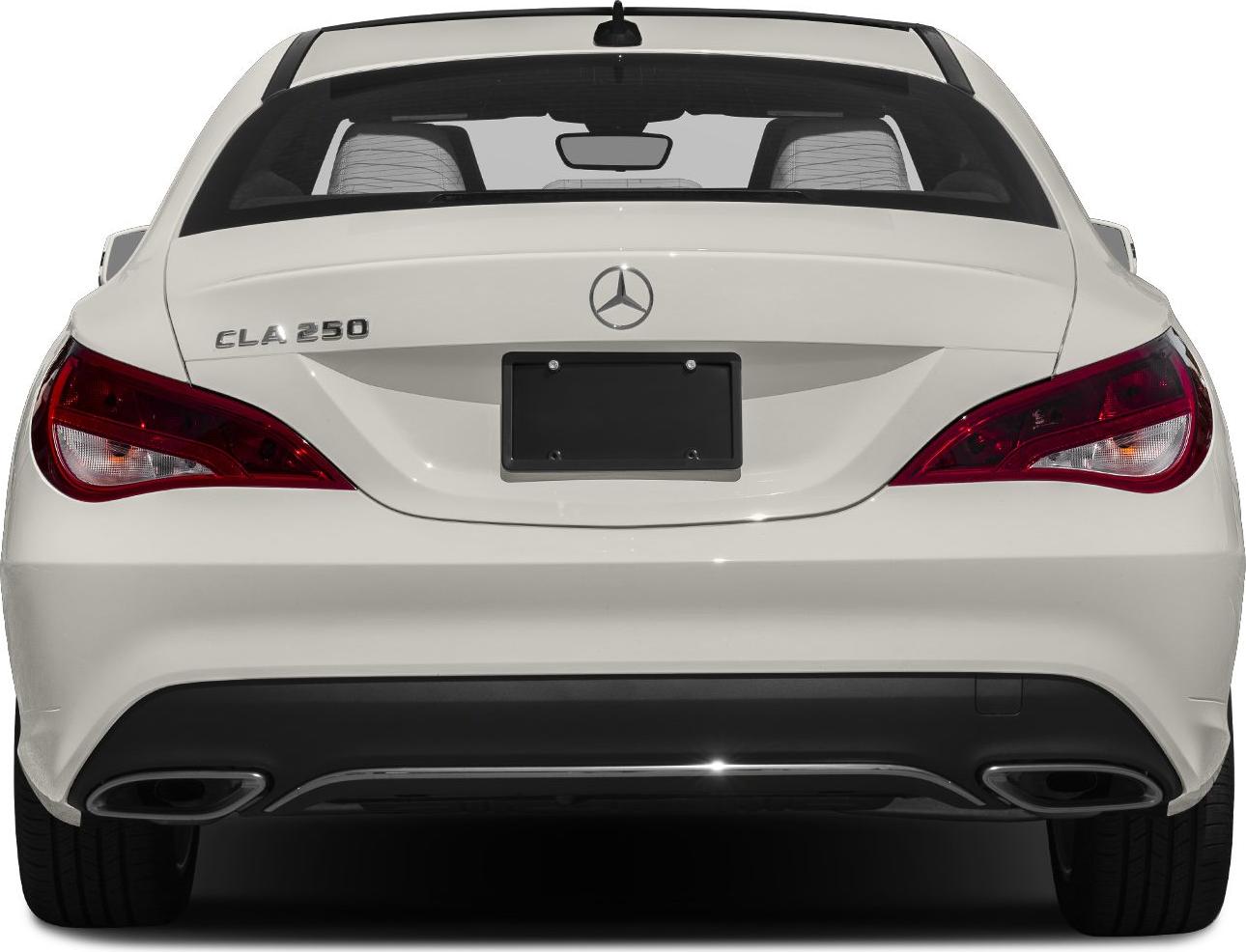 Rear view showing distinct tail lights and dual exhausts of a coupe.
