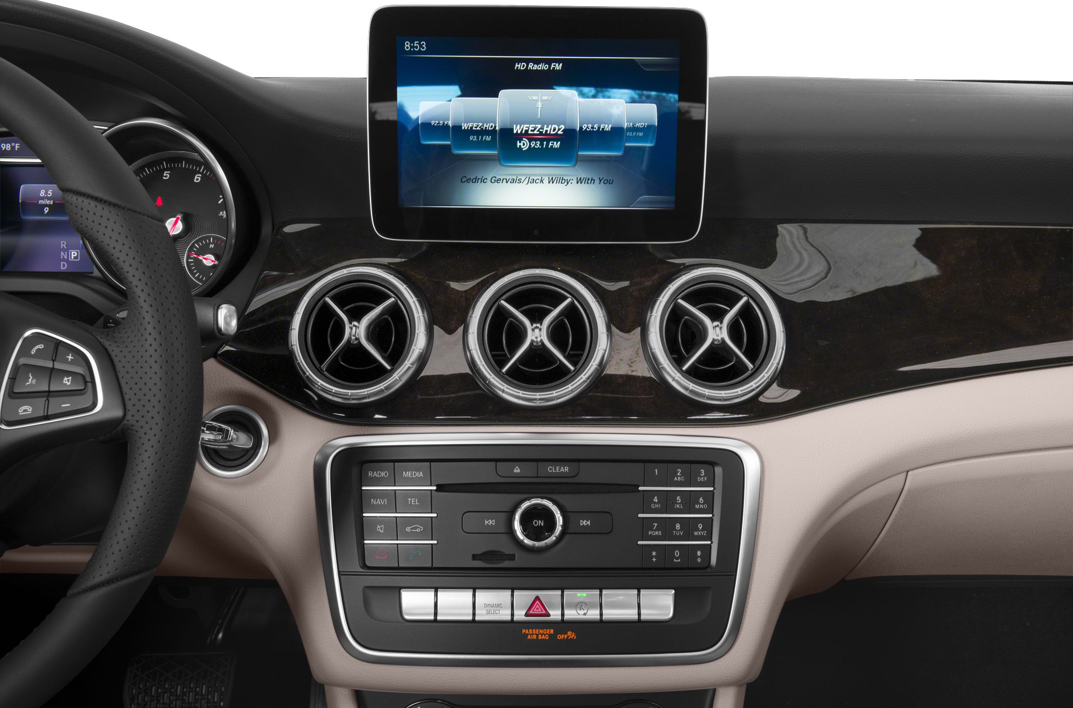 Dashboard with tri-circular air vents and infotainment display