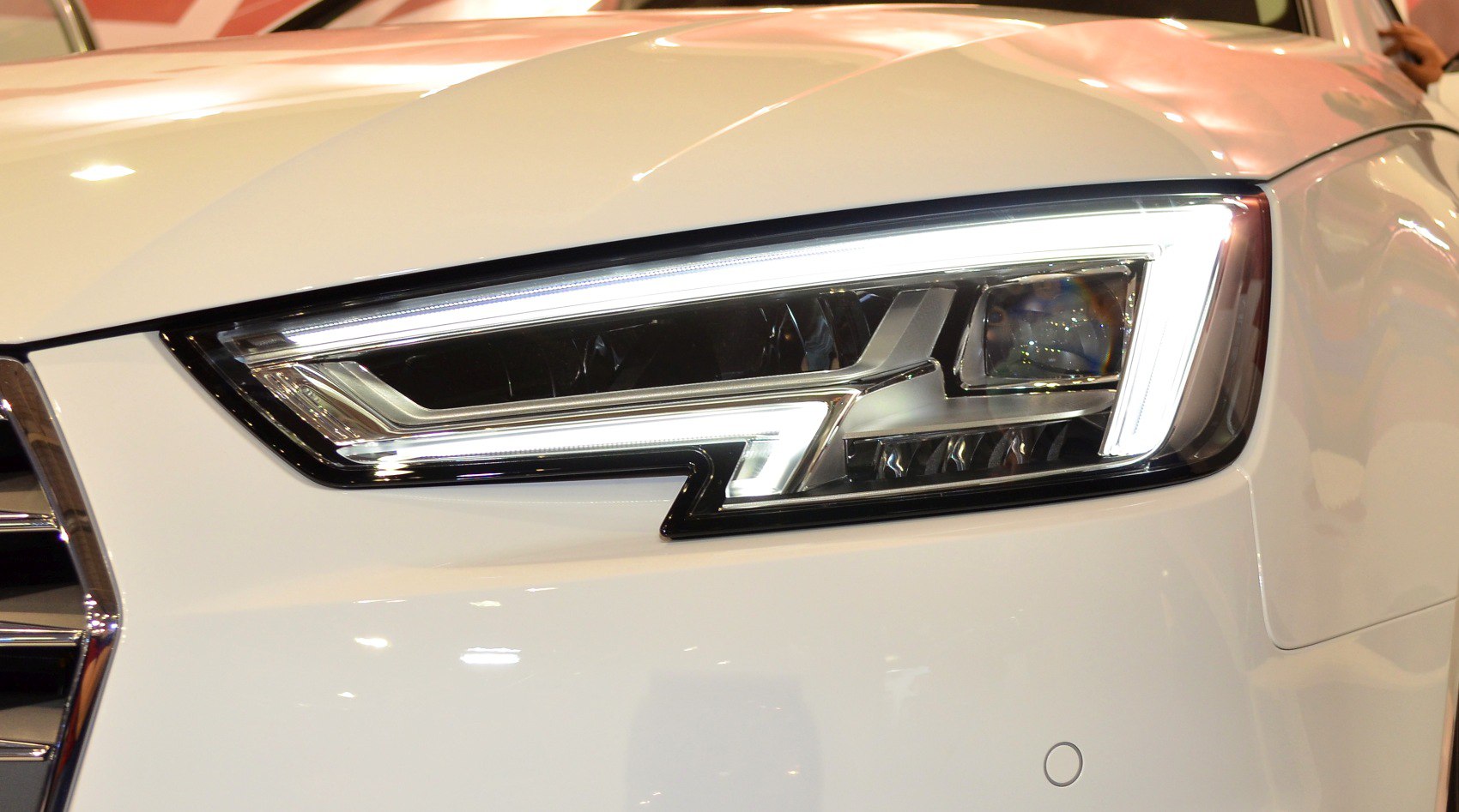 Close-up of modern LED headlight with distinctive angular design