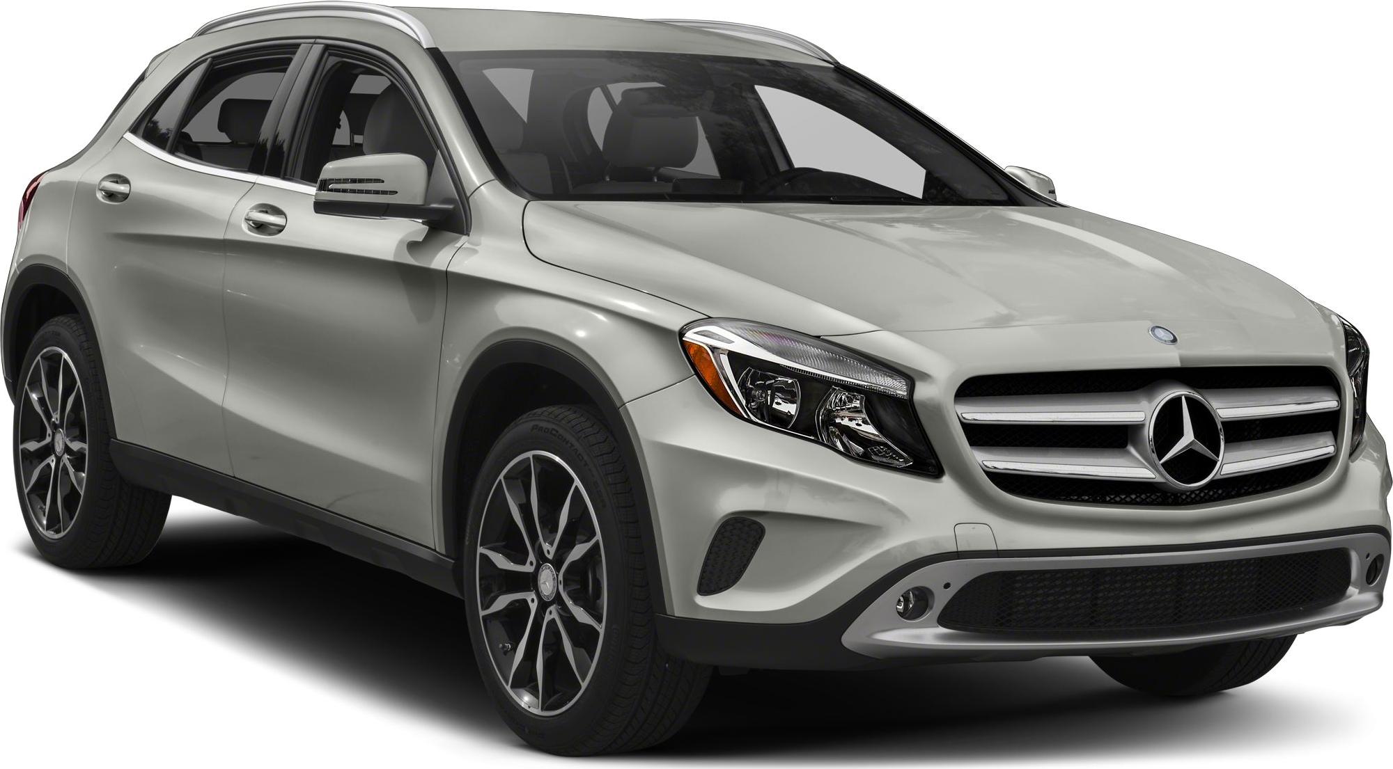 Front view of luxury compact SUV with prominent grille and headlight design